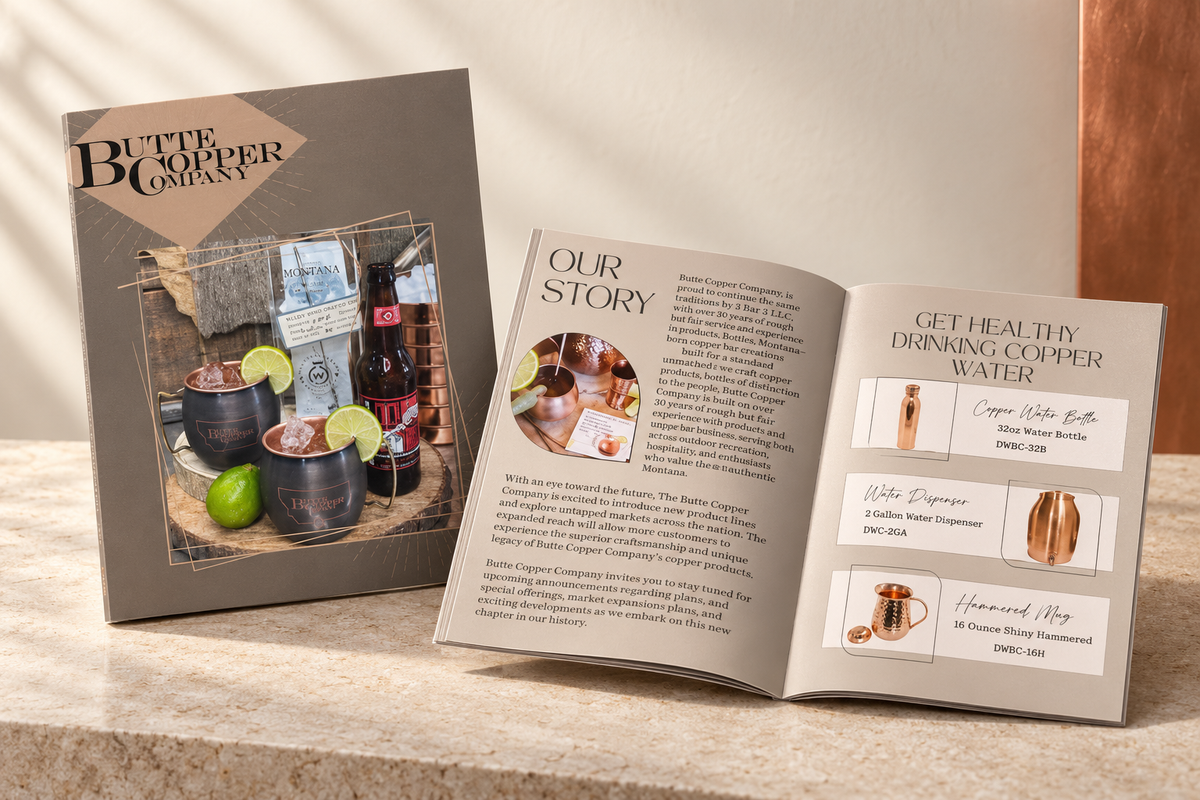 Butte Copper Company catalog cover and open spread in a warm ivory studio portfolio mockup